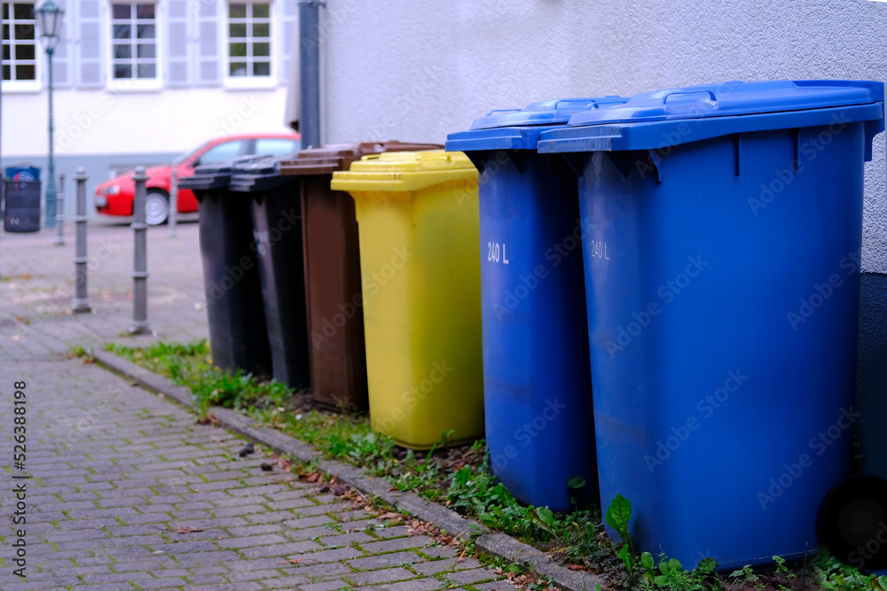 row of plastic garbage container, in Germany, garbage collection in