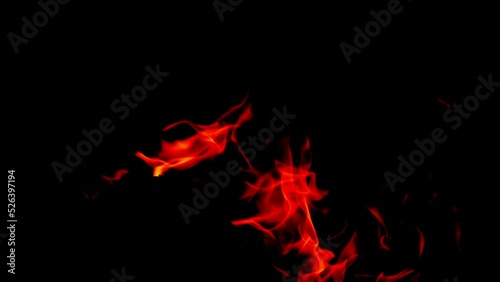 Slow motion video blazing flames on black background.