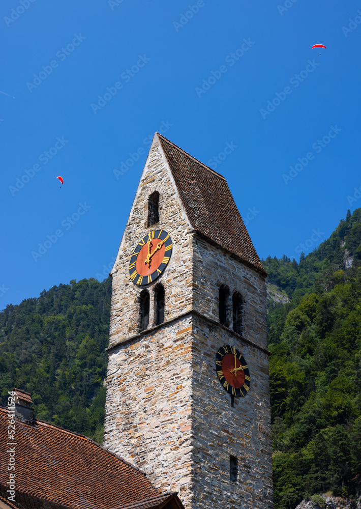 Fototapeta premium Historic christian stone church and bell tower in Interlaken, Switzerland