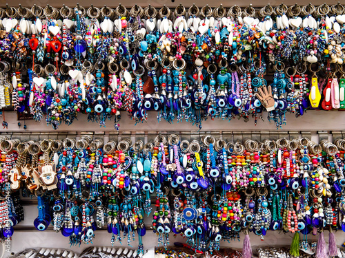 Wallpaper Mural Traditional evil eye bead - protection amulet on keychain at souvenir store. Popular touristic souvenir and talisman in different countries around world. Symbol of protection against malevolent gazes Torontodigital.ca