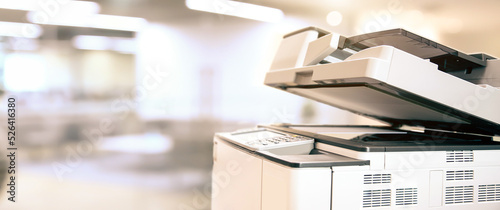 Photocopier printer, Close up the copier or photocopy machine office equipment workplace for scanner or scanning document and printing or copy paper duplicate and Xerox. photo