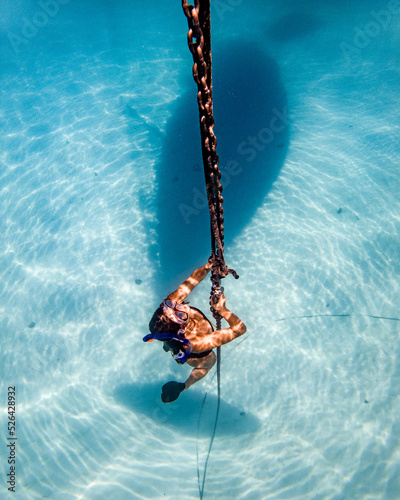 freediving on anchor chain - Great Barrier Reef photo