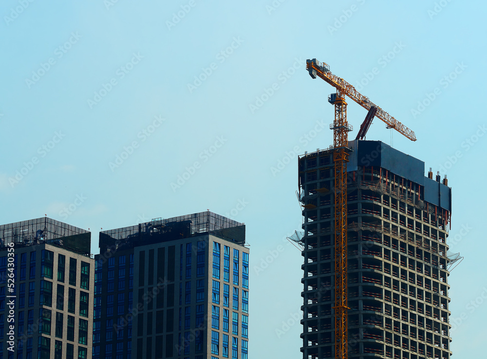 Construction crane doing new architecture background