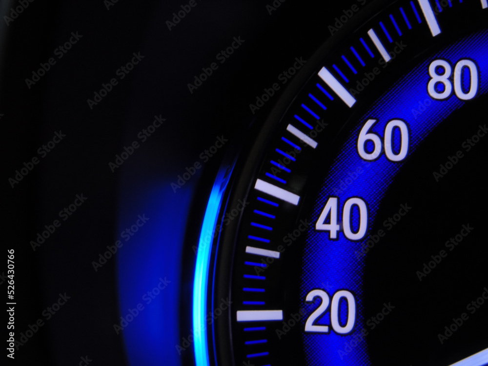 close up of a speedometer on black close up of a speedometer on black