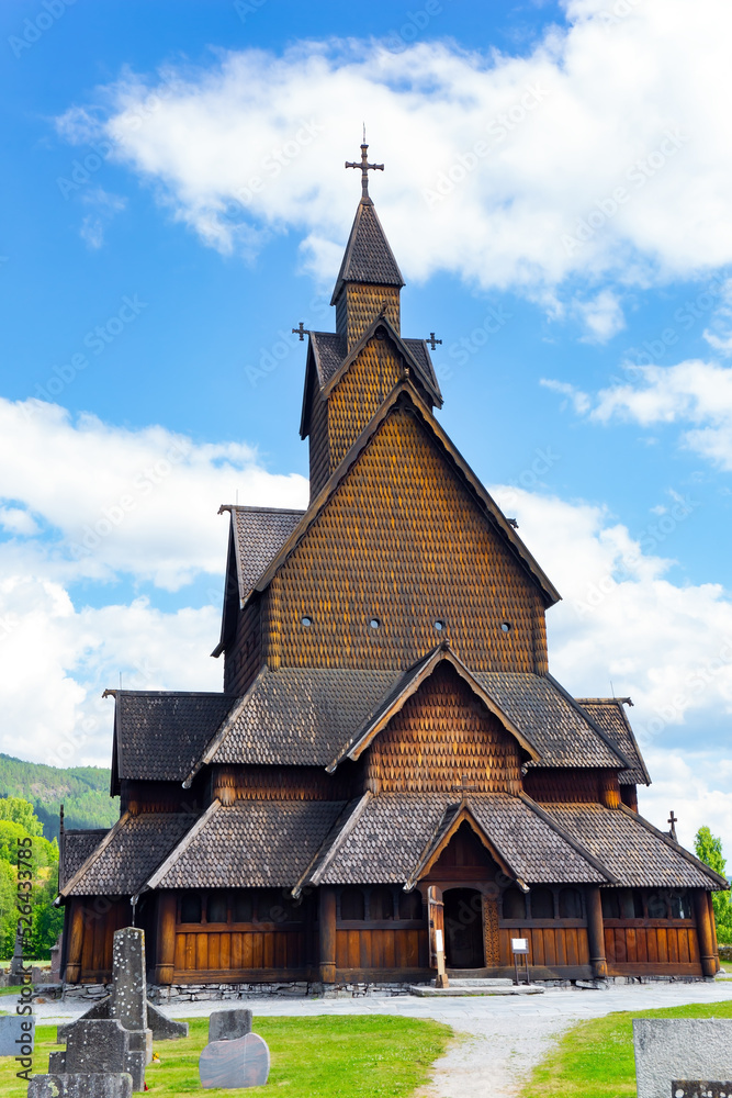 The Stave Church is crowned with crosses