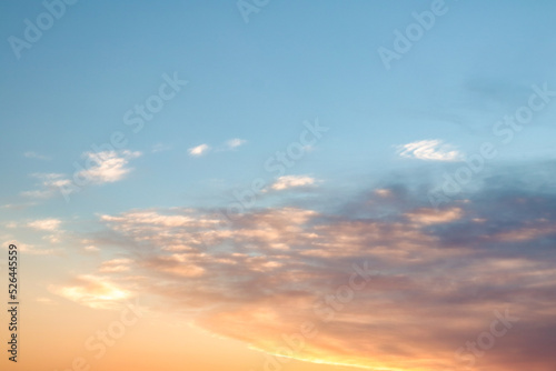 sunset orange clouds in blue sky © PH alex aviles