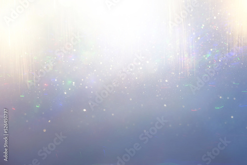 background of abstract gold, blue and silver glitter lights. defocused