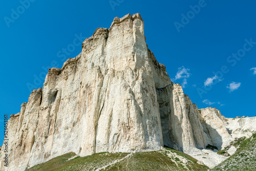 Cuadro en lienzo white chalk limestone rock against a blue sky aerial view