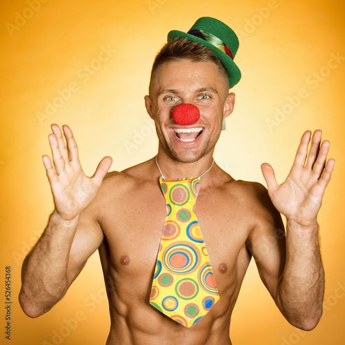 Tela Young attractive clown. Handsome man.