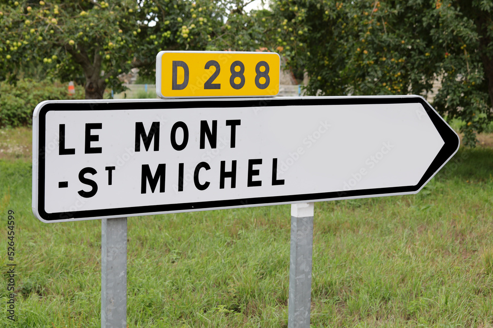 arrow with the inscription LE MONT ST MICHEL place where there is the island of the famous abbey in France