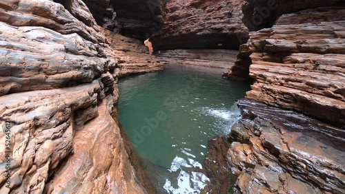 Kermits Pool swimming hole located in a canyon at the end of the Spider Walk at Hancock Gorge in Karijini National Park, Pilbara region Western Australia.