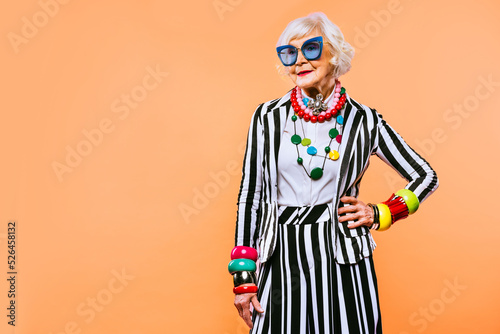 Quadro em tela Cool and stylish senior old woman with fashionable clothes - Funny colorful port