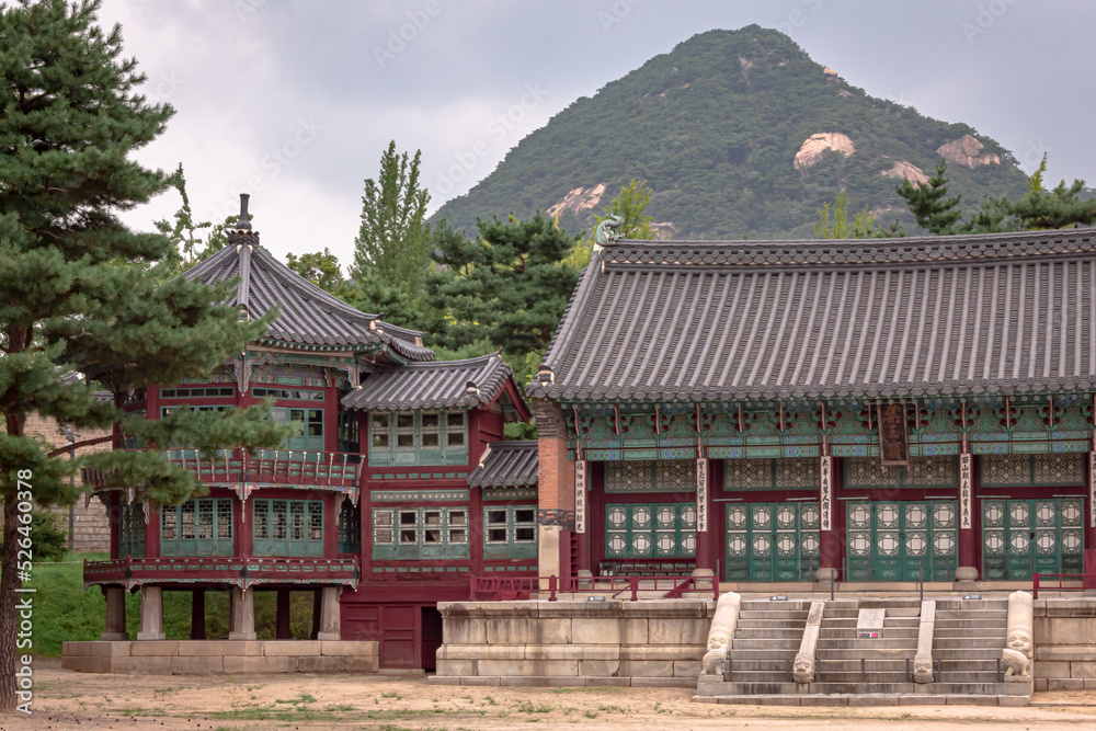 Colorful traditional wood Korean architecture temple building complex Gyeongbokgung Palace in Seoul South Korea	