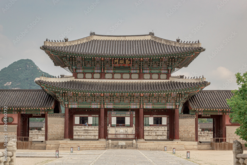 Fototapeta premium Colorful traditional wood Korean architecture temple building main entrance gate Changdeokgung Palace in Seoul South Korea