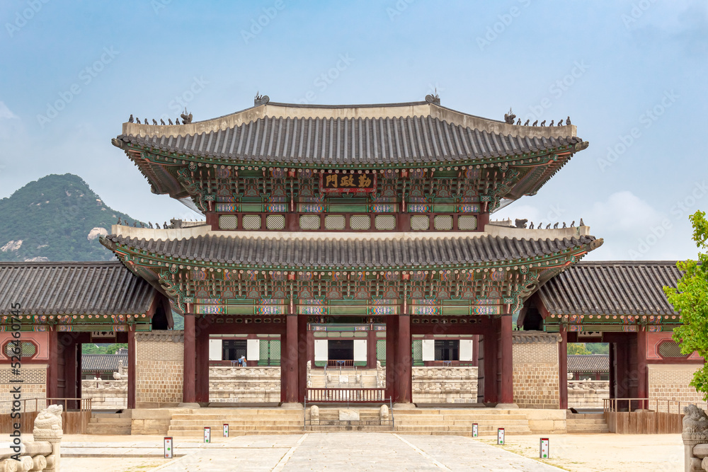 Colorful traditional wood Korean architecture temple building main entrance gate Changdeokgung Palace in Seoul South Korea	