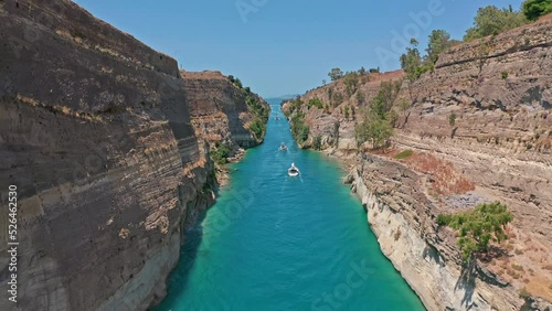 Beautiful Corinth Canal aerial view in Greece. Boats passing sea channel photo
