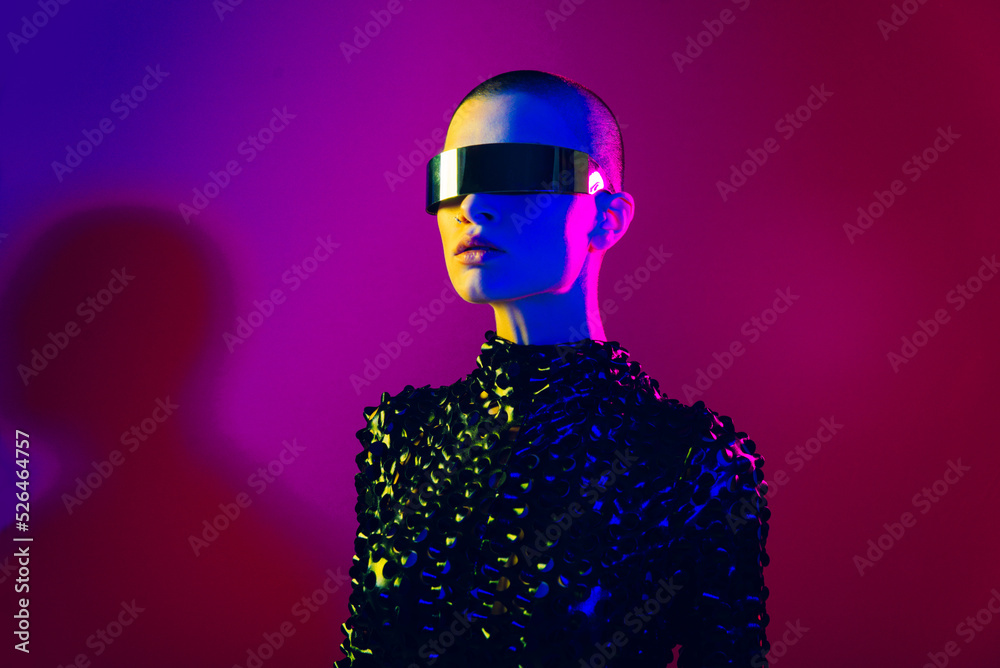 Beautiful woman with stylish clothes - Futuristic portrait of young female with colorful lighting, metaverse and creative fashion concepts - obrazy, fototapety, plakaty 