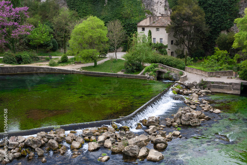 View of the Fontaine-de-Vaucluse village in Provence region, France photo