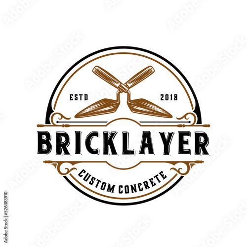 building vintage logo design. with a hand trowel concept in a vintage circle shape, perfect for construction companies