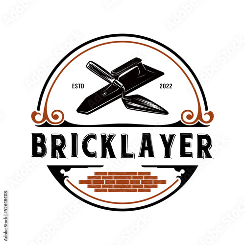 building vintage logo design. with a hand trowel concept in a vintage circle shape, perfect for construction companies