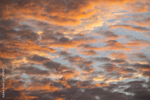 Dramatic orange colour sky with clouds during sunset © JCM