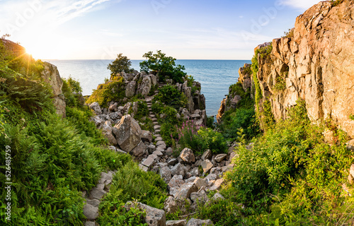 sunset view of the Røverborgen at the coast of baltic sea on bornholm denmark