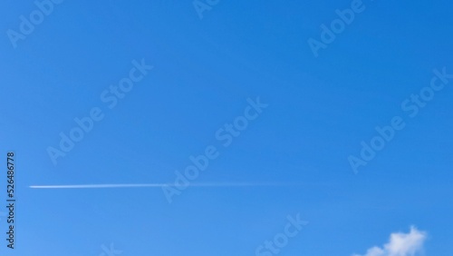 Billede på lærred Light blue sky and airplane