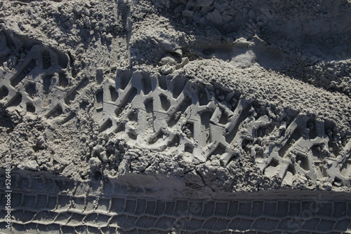 car footprint on the beach