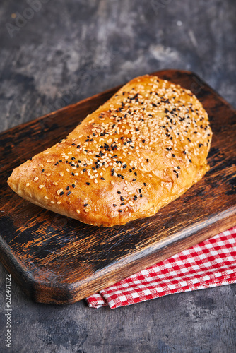 Samosa, samsa meat stuffed pies. Uzbek national dish samosa. Concept of Central Asian, South and East Asian cuisine photo