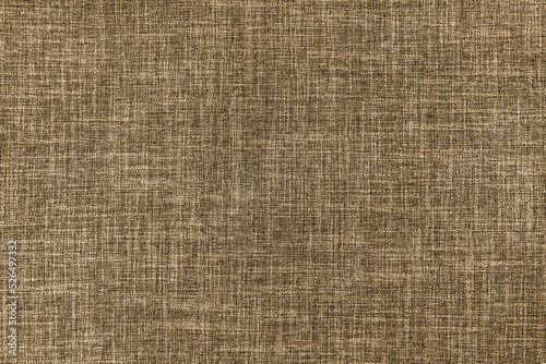 Texture of natural brown upholstery fabric or cloth. Fabric texture of natural cotton or linen textile material. Brown canvas background. Decorative fabric for curtain, furniture, walls, clothes