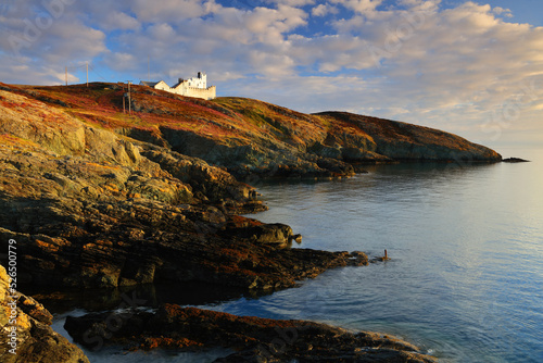 Morning light on Point Lynas Lighthouse. Anglesey, North Wales, UK.