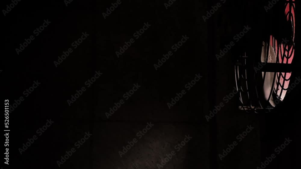 Rotating fan bladders in a dark room with light rays passing through a dramatic look and dark atmosphere of the prison. High quality FullHD footage Rotating fan bladders in a dark room with light rays passing through a dramatic look and dark atmosphere of the prison. High quality FullHD footage