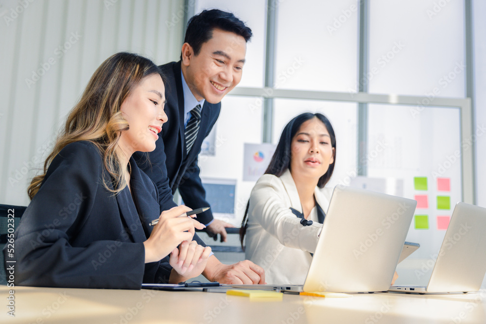 Group of young business people working together in modern office, Business colleague discussing looking and doing video conference on computer Group of young business people working together in modern office, Business colleague discussing looking and doing video conference on computer