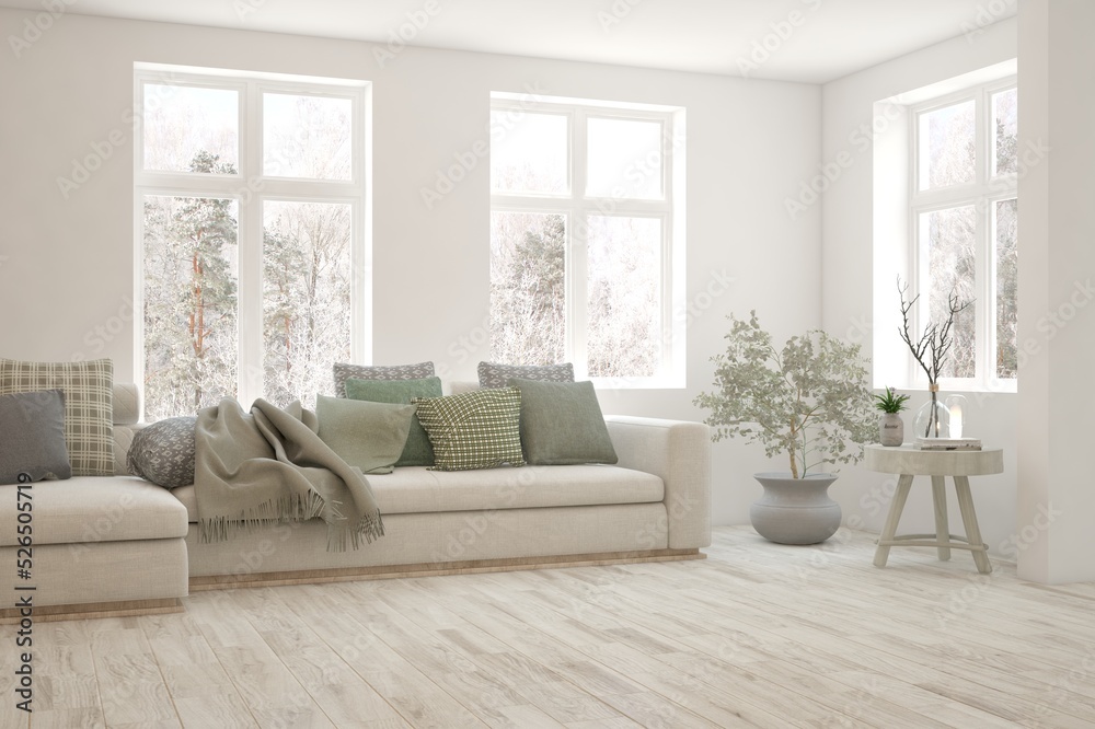 Fototapeta premium White living room with sofa and winter landscape in window. Scandinavian interior design. 3D illustration