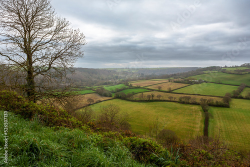 Countryside in the Torridge valley, from the high vantage point of Great Torrington Common, Devon, UK, on a cloudy day photo