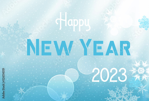 Happy New Year card with a bokeh snow crystal background. Text Happy New Year 2023.