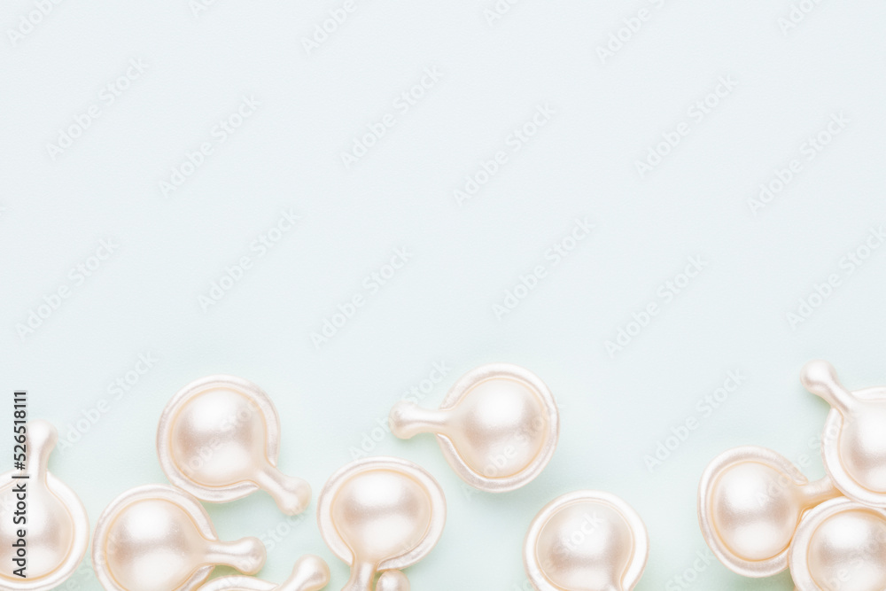 Hyaluronic acid capsule on pastel background. Hyaluronic acid capsule on pastel background.