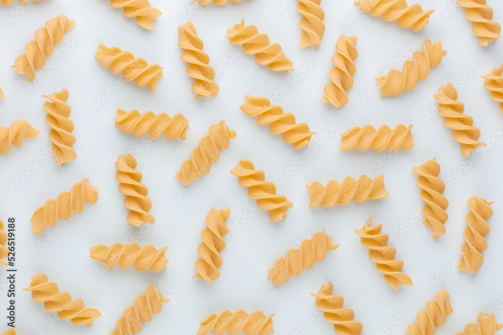Pattern made of pasta on pastel background. Flat lay. Pattern made of pasta on pastel background. Flat lay.