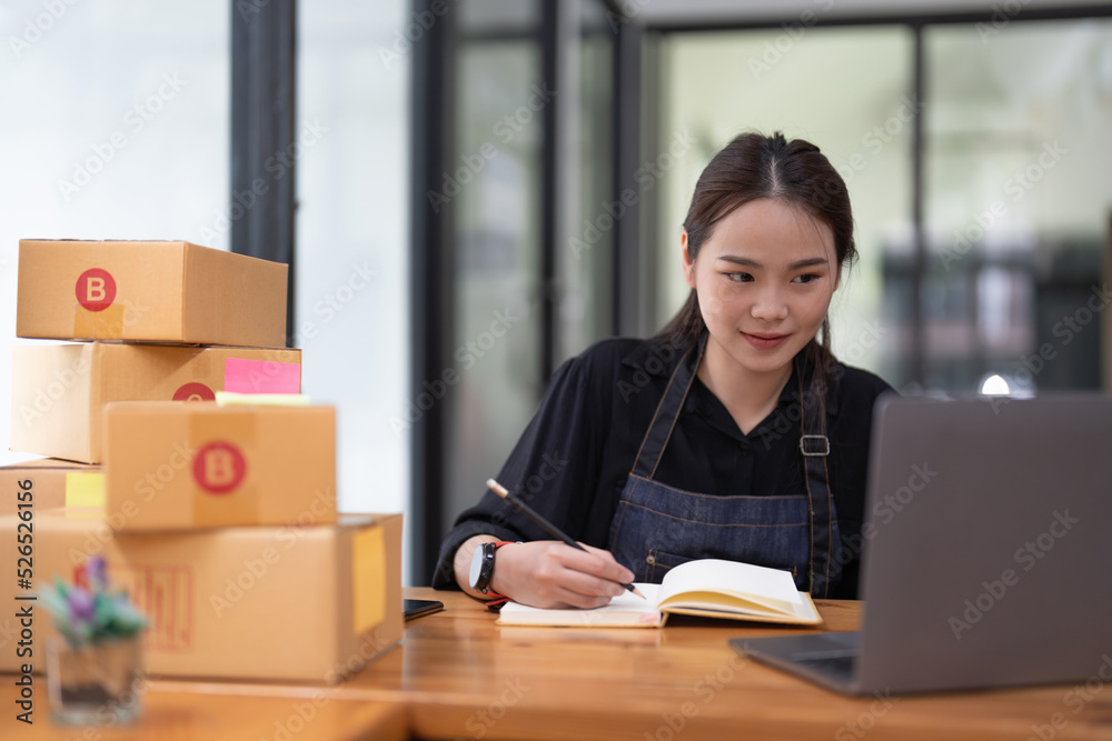 Portrait asian female entrepreneurs and online sales. self-employed, working at home with a small business owner. Portrait asian female entrepreneurs and online sales. self-employed, working at home with a small business owner.