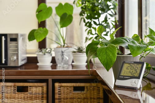 Thermometer hygrometer measuring the optimum temperature and humidity in a house