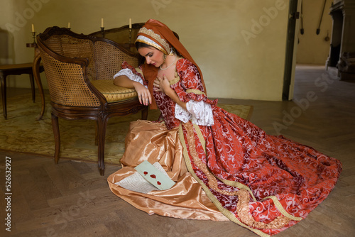 Lady in medieval dress with letter