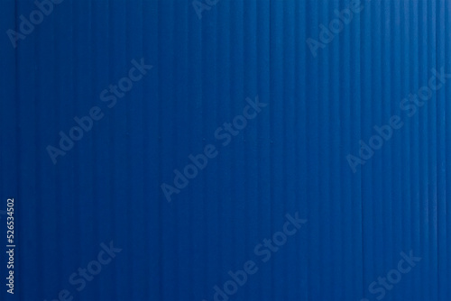 Blue abstract lined texture of an old striped background wall.