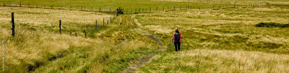 woman hiking in countryside- Cantal,  auvergne,  lozere- France
