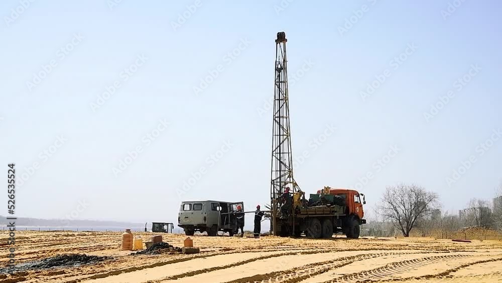 Workers are drilling a well for groundwater Workers are drilling a well for groundwater