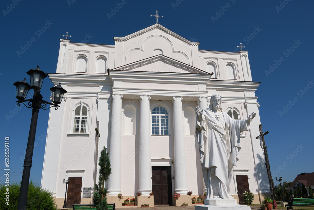 Fototapeta premium Old ancient catholic church of Saints Cosmas and Damian in Ostrovets city, Grodno region, Belarus.