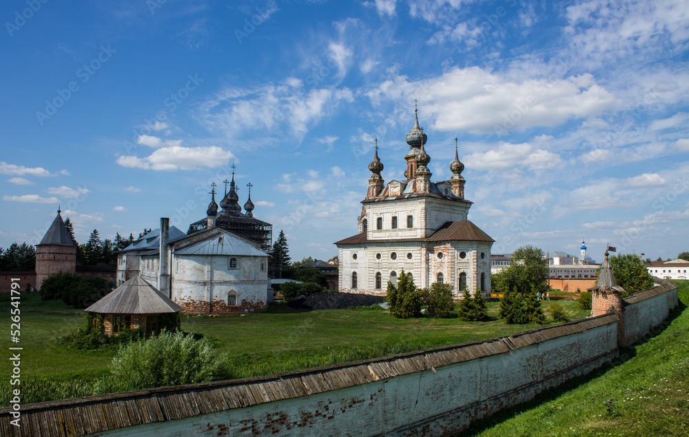 Ancient white-stone St. George's Cathedral in the old town of Yuriev Polsky, Vladimir region, Russia on a clear sunny summer day