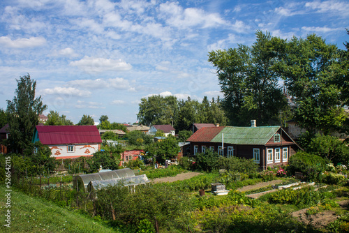 Wallpaper Mural Panoramic view of the old town of Yuriev-Polsky Russia with wooden houses among the green foliage of trees on a sunny summer day Torontodigital.ca