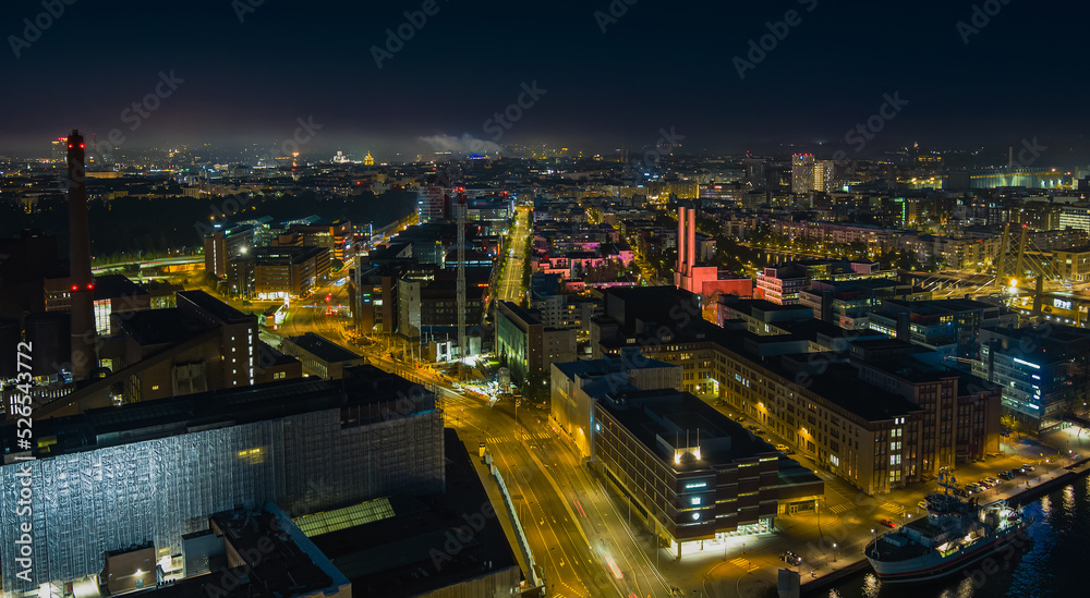 Aerial view of night city. Twilight aerial cityscape