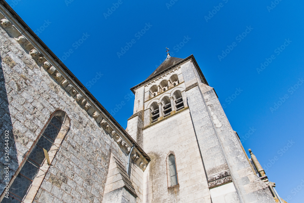 Church of Saint Hilaire de Châteauvieux under a blue sky