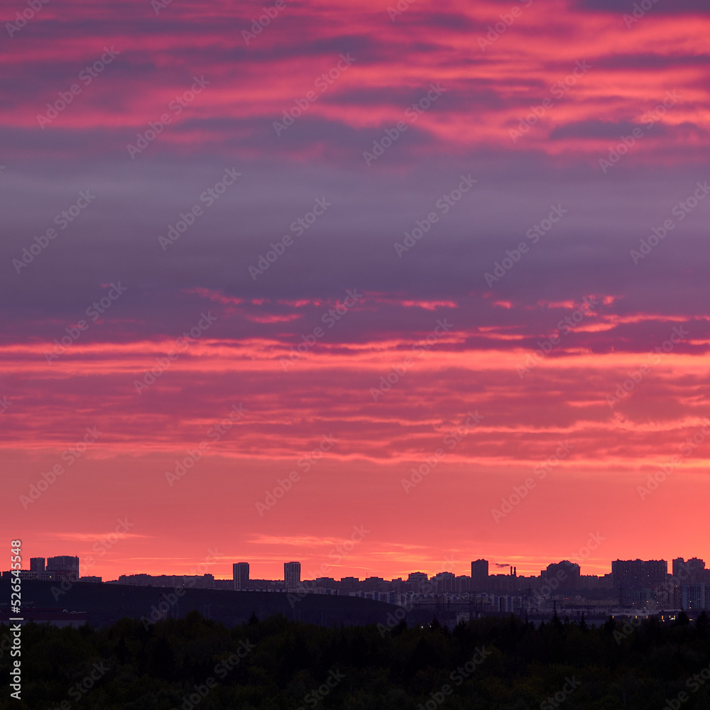 Evening sky with pink clouds at sunset, cloudy landscape